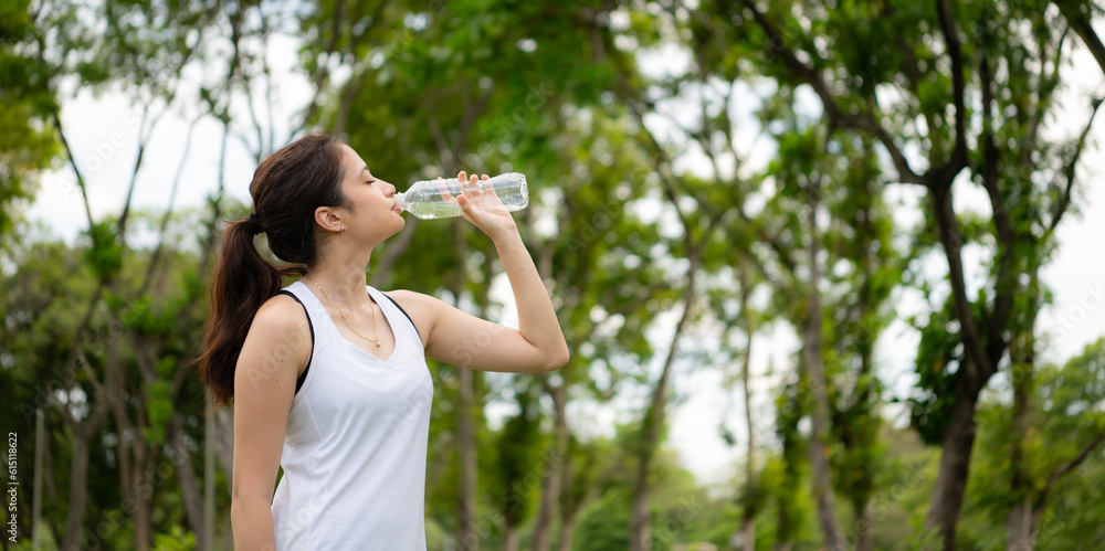 Young female with outdoor activities in the city park, Yoga is her chosen activity. Young female with outdoor activities in the city park, Yoga is her chosen activity.