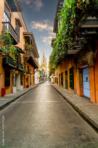 Vertical photo of Cartagena street in colombia with church and colonial balcony in old city  © Blogtrip