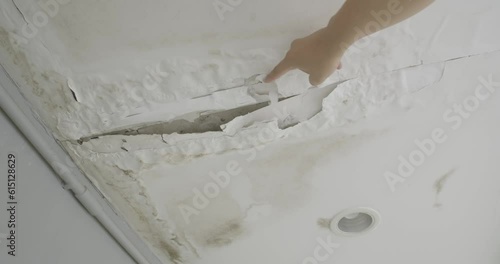 Ceiling panels with fungus outside house from water pipes damaged or rainy leaked. Office building or house problem for house service.
