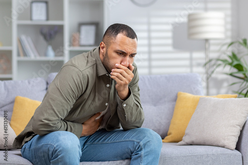 Slika na platnu A young African American man is not feeling well