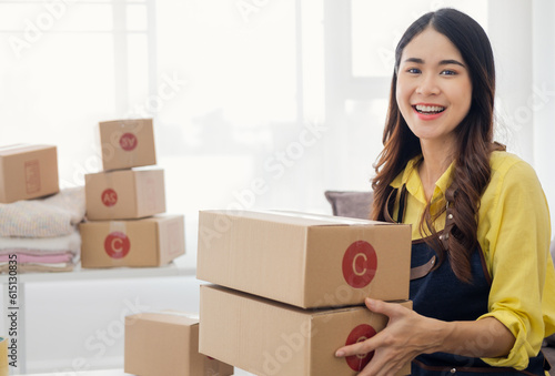 Small Entrepreneurs Start A Home Business By Arranging Goods With Brown Parcel Boxes, Small Home Business Startup Ideas.. © Fahng