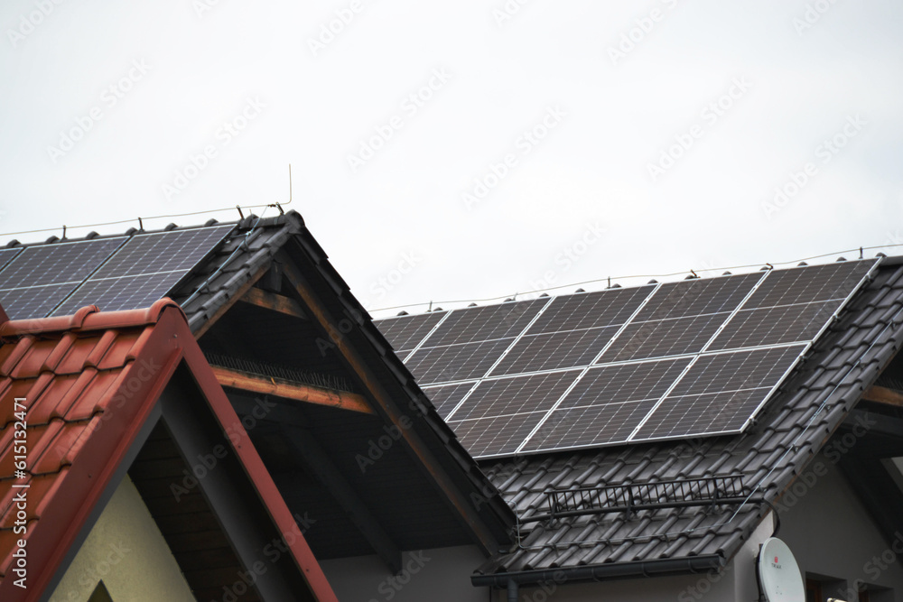 Fototapeta premium Installing a Solar Cell on a Roof.