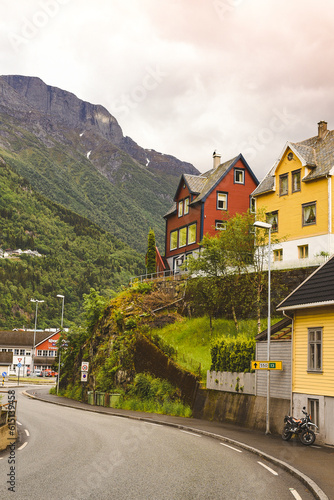 Colored bright houses in Norway village. Traditional scandinavian typical architecture. © Olena Poberezhna