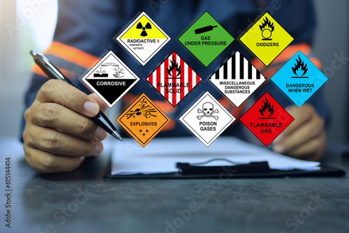 Canvas Print Security officers working with clipboards and inspect the storage of dangerous goods hazard substance on the desktop for operator safety such as explosions, radioactive, toxic gases, etc