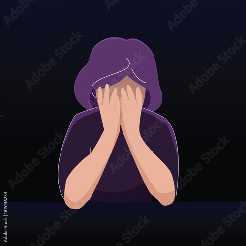 The woman is sitting at the table and has her head on her hands. She is sad and suffering. The concept of powerlessness, sadness, depression, sadness of difficult life circumstances.
