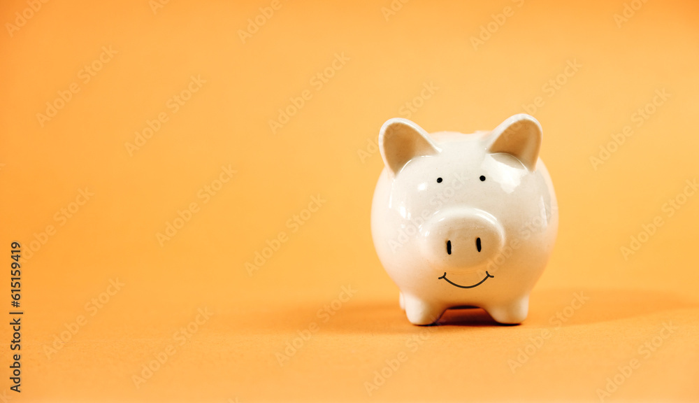Finance concept, saving money, white piggy bank on seamless yellow background. Finance concept, saving money, white piggy bank on seamless yellow background.