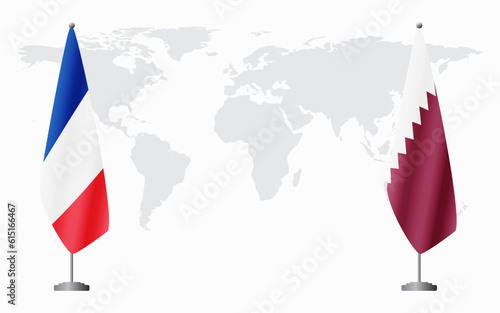 France and Qatar flags for official meeting