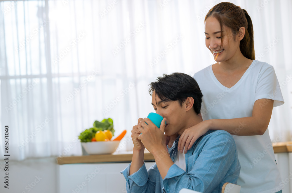 Married couples spend a few tender minutes before staring their workday. Sharing, laughing, teasing, serving each other loaf and beverage, Mutual understanding, sympathy and a supportive life partner Married couples spend a few tender minutes before staring their workday. Sharing, laughing, teasing, serving each other loaf and beverage, Mutual understanding, sympathy and a supportive life partner