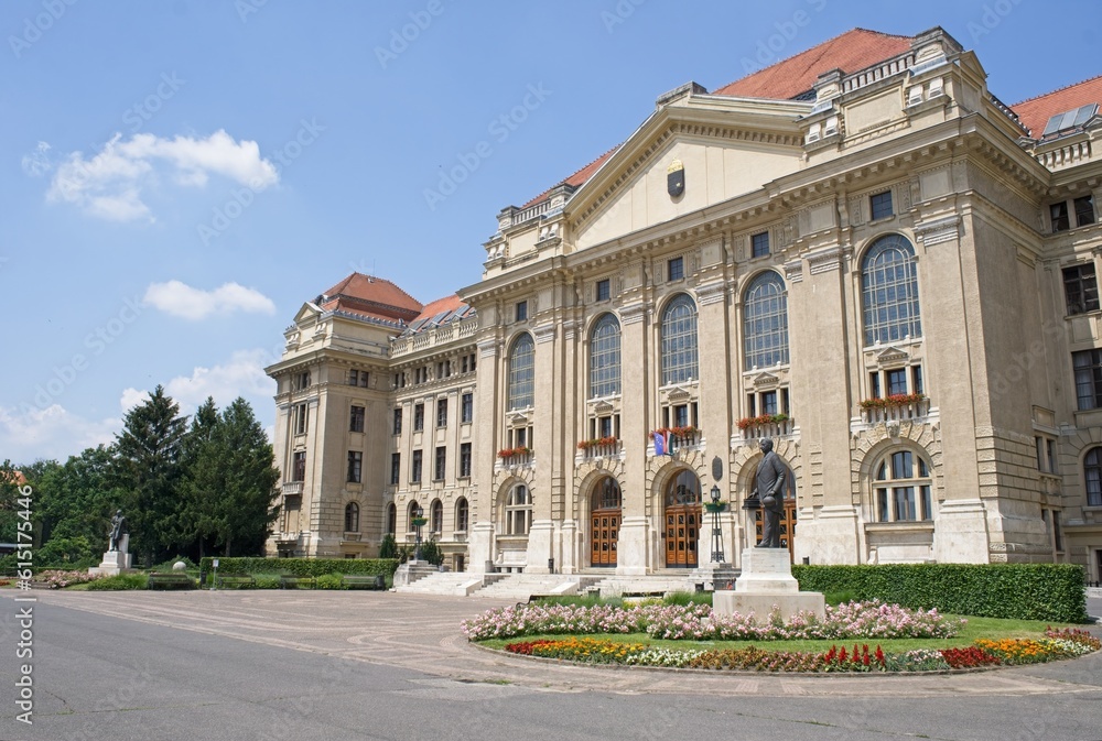 Debrecen, Hungary - Jun 18, 2023: A walking in the center of Debrecen city in northeastern Hungary in a sunny spring day. University. Selective focus.