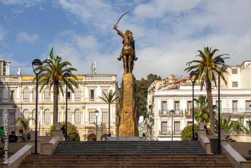 Algiers (Alger), Algeria, April 19 2023 : Emir Abdelkader Statue in the Emir Abdel Kader square, situated near Alger Centre and the City Hall. Text in English : tribute to this historic character.