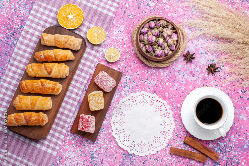 top view cup of tea with marmalade pieces and bagels on pink background sweet sugar tea lemon color