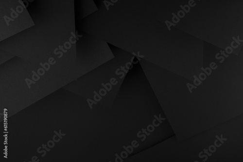 Rich black abstract geometric background with pattern of angles   polygonal shapes and triangles as relief in futuristic style  for design  flyer  poster  card  advertising  text  border  copy space.