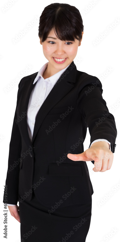 Digital png photo of smiling asian businesswoman pointing with finger on transparent background Digital png photo of smiling asian businesswoman pointing with finger on transparent background