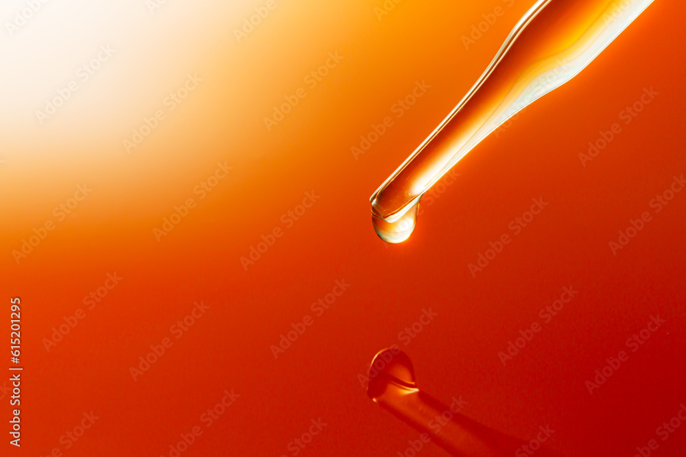 Macro science experiment pipette surface,Top view macro shot of chemical dropper injects oil into clear fluid in one of three petri dishes on yellow background , Abstract skin care cosmetics formulati Macro science experiment pipette surface,Top view macro shot of chemical dropper injects oil into clear fluid in one of three petri dishes on yellow background , Abstract skin care cosmetics formulati