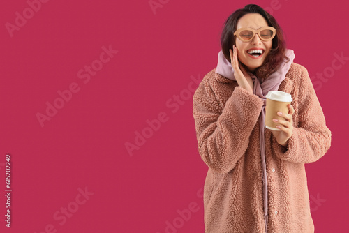 Stylish young woman in tedd...