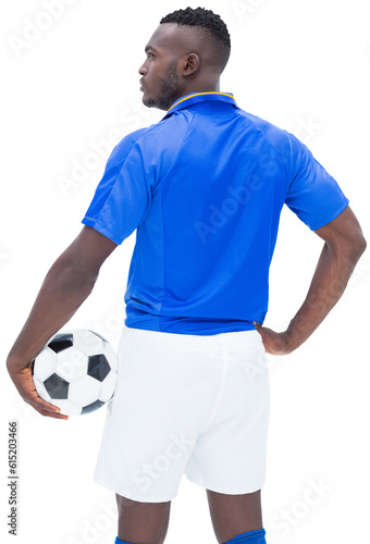 Digital png photo of back view of african american footballer holding ball on transparent background