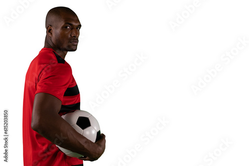 Digital png photo of african american footballer holding ball on transparent background