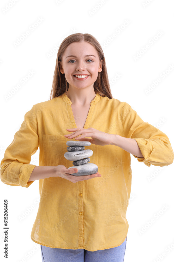 Young woman with spa stones on white background. Balance concept Young woman with spa stones on white background. Balance concept