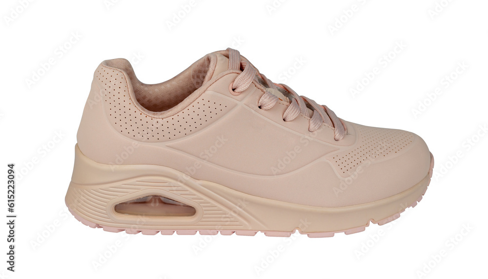 Woman's sneaker isolated from background. Pink color. Profile view Woman's sneaker isolated from background. Pink color. Profile view