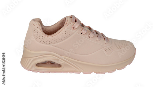 Woman's sneaker isolated from background. Pink color. Profile view