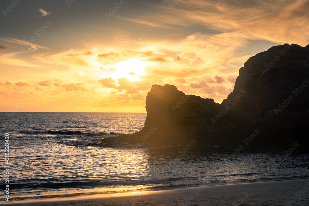 Beautiful sunset over the Atlantic Ocean at Papagayo Beach, Lanzarote,  Canary Islands, Spain