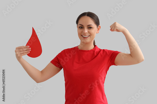 Female donor with paper blo...