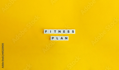 Fitness Plan Concept. Block Letter Tiles on Yellow Background. Minimal Aesthetics.