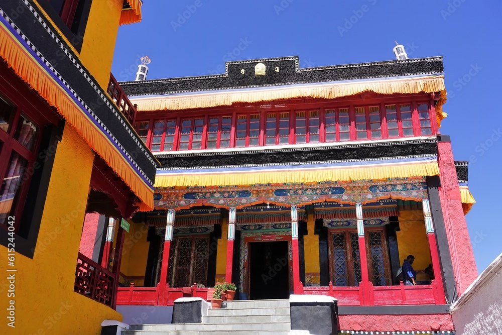 Experience the allure of Tibetan Buddhism at Thiksey Monastery in Ladakh, India. This colorful stock photo showcases an iconic main hall with a massive Buddha statue, radiating spiritual tranquility. Experience the allure of Tibetan Buddhism at Thiksey Monastery in Ladakh, India. This colorful stock photo showcases an iconic main hall with a massive Buddha statue, radiating spiritual tranquility.