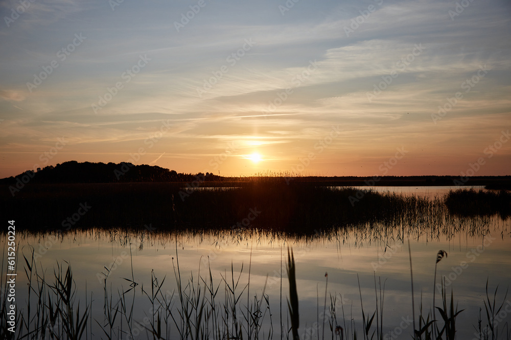 A beautiful sunset on a lake, selective focus