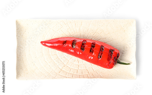 Plate with tasty grilled chili pepper isolated on white background