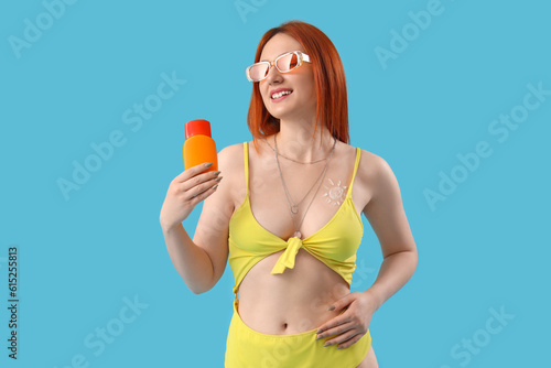 Young woman with sun made o...