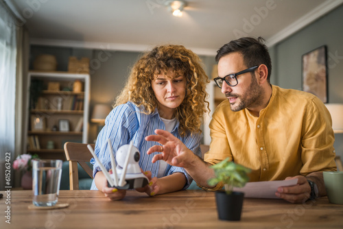 Couple at home connect and install cctv security surveillance camera