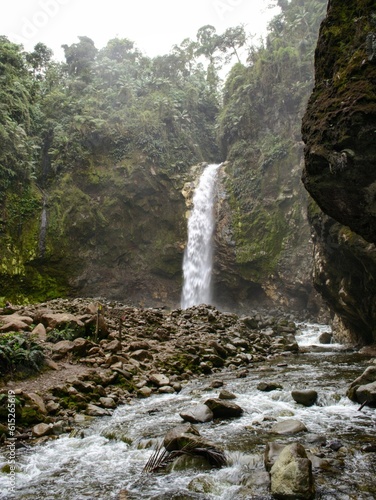 Cascada en ambiente Jurásico, rocas antiguas, Rio ácido proveniente de un Volcán. photo