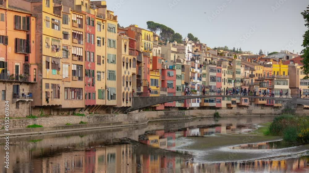 day time girona city center famous colored buildings crowded pedestrian bridge riverside panorama 4k timelapse andorra day time girona city center famous colored buildings crowded pedestrian bridge riverside panorama 4k timelapse andorra