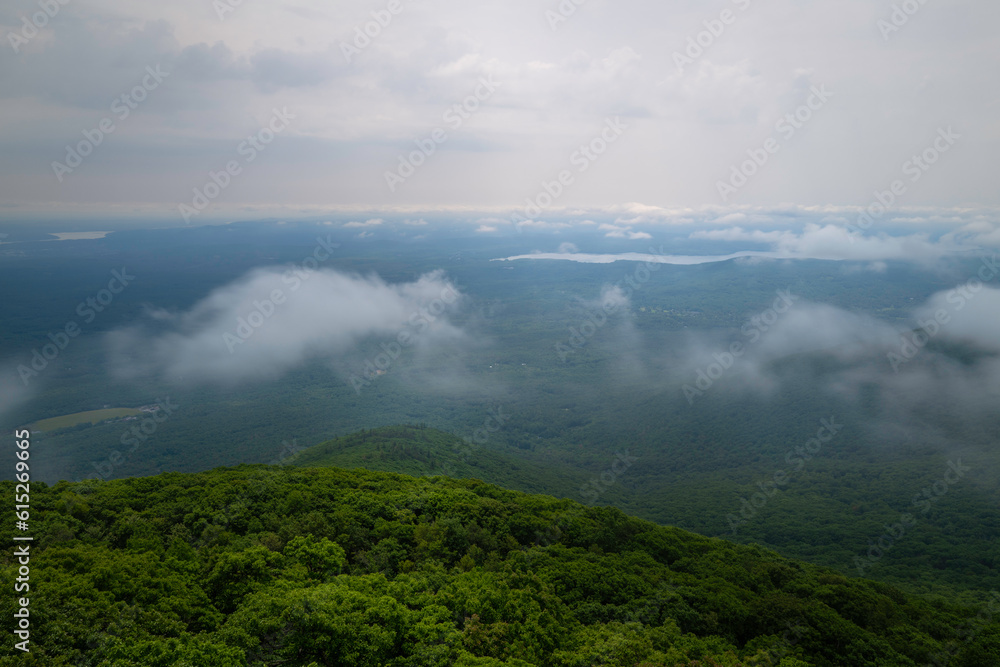 Tranquil aerial mountain landscape and floating cloudscape in Upstate New York, view from the Lookout Mountain