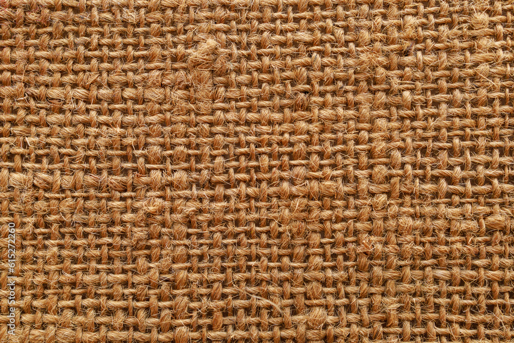 Rough textured surface of burlap or canvas close-up. Background or backdrop. Design blank Rough textured surface of burlap or canvas close-up. Background or backdrop. Design blank