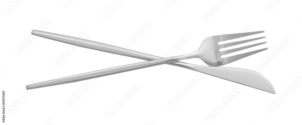 Knife and fork isolated on white, top view. Stylish shiny cutlery set Knife and fork isolated on white, top view. Stylish shiny cutlery set
