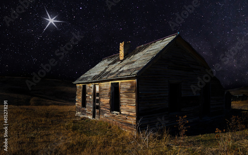 Bright star shining above an abandoned settler's house on Christmas Eve