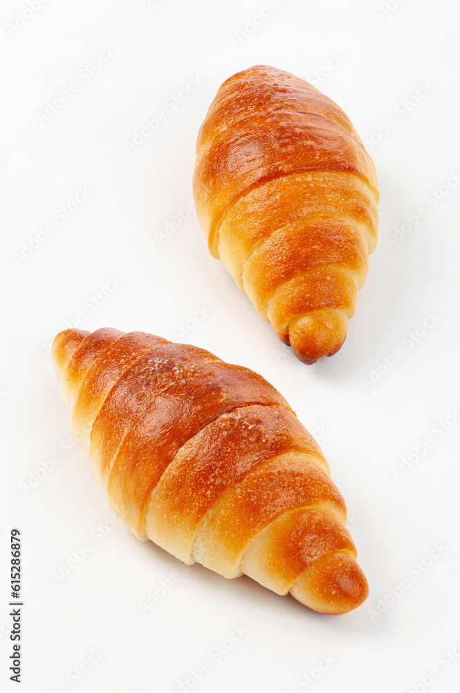 fresh croissant isolated on white background. fresh croissant isolated on white background.