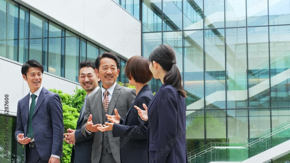 custom made wallpaper toronto digitalGroup of various generation Asian businesspeople talking in front of office building. Office workers discussing for success.