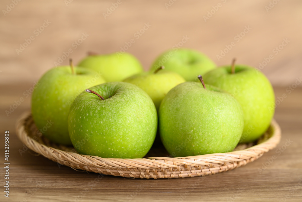 Green apple fruit in basket on wooden background, Healthy fruit Green apple fruit in basket on wooden background, Healthy fruit