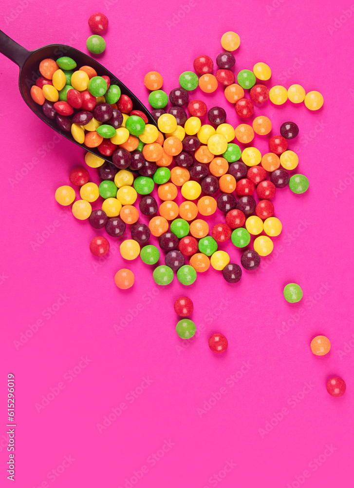 Different colored round candy. Different colored round candy.