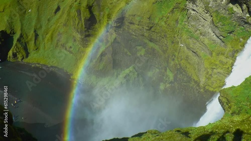 Top-down, slow motion footage of Skogafoss Waterfall with rainbow - waterfall located on the Skoga River in south Iceland. photo