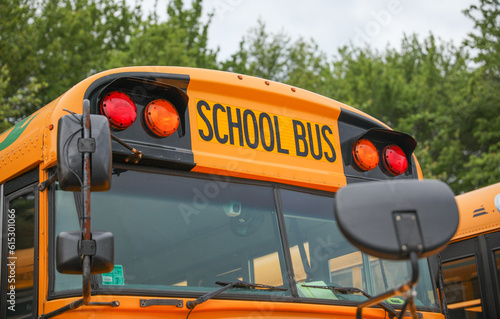 yellow school bus, a symbol of education and childhood nostalgia, waiting to transport students on their educational journey