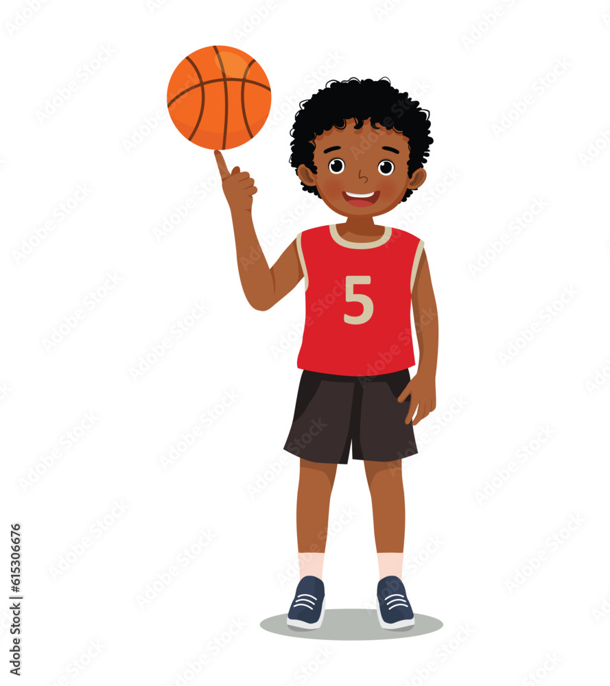 Cute little African boy with sportswear spinning basketball on his finger