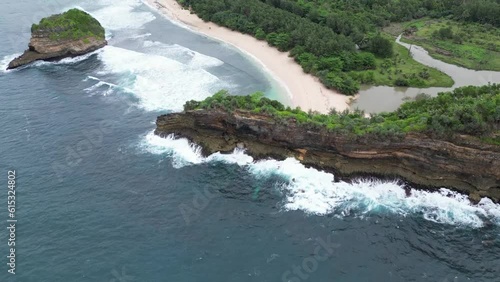 Aerial footage of the cliffs of ngudel beach, Malang, East Java,Indonesia photo