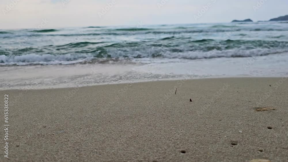 Closeup Of Waves Splashing On The Sandy Shoreline, Paradise Beach, Thassos Island, Greece Closeup Of Waves Splashing On The Sandy Shoreline, Paradise Beach, Thassos Island, Greece