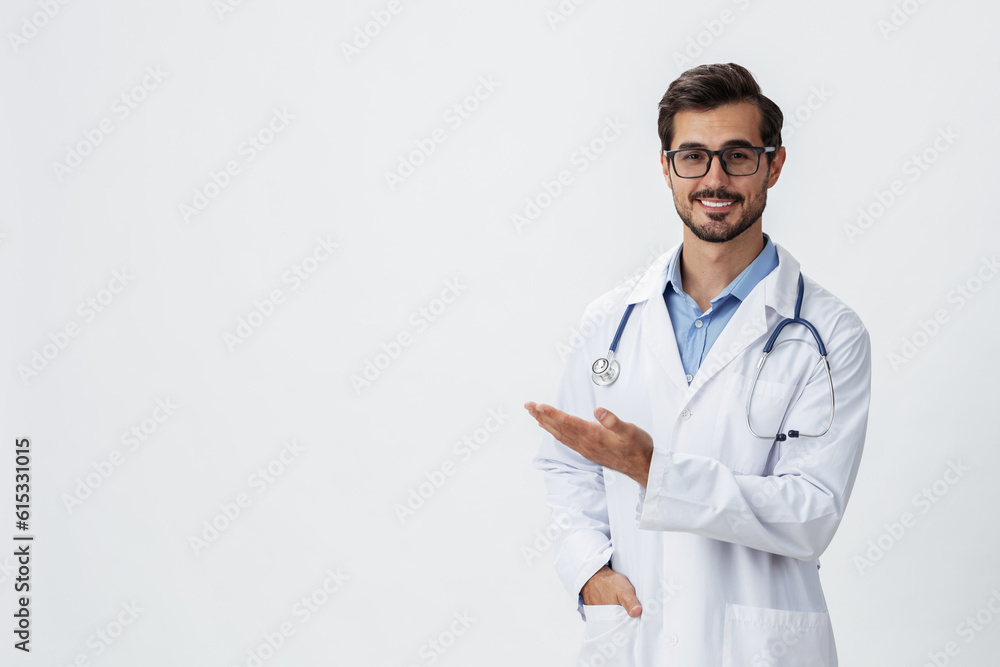 Man doctor in white coat and eyeglasses smile shows hand gestures signs on white isolated background looks into camera, copy space, space for text, health Man doctor in white coat and eyeglasses smile shows hand gestures signs on white isolated background looks into camera, copy space, space for text, health