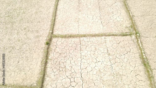 Aerial view of parched farmlands as harsh drought continues. Overhead shot