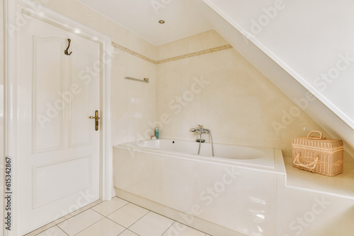 a bathroom with a tub, sink and toilet roll - top in the corner of the bathtub is next to the door